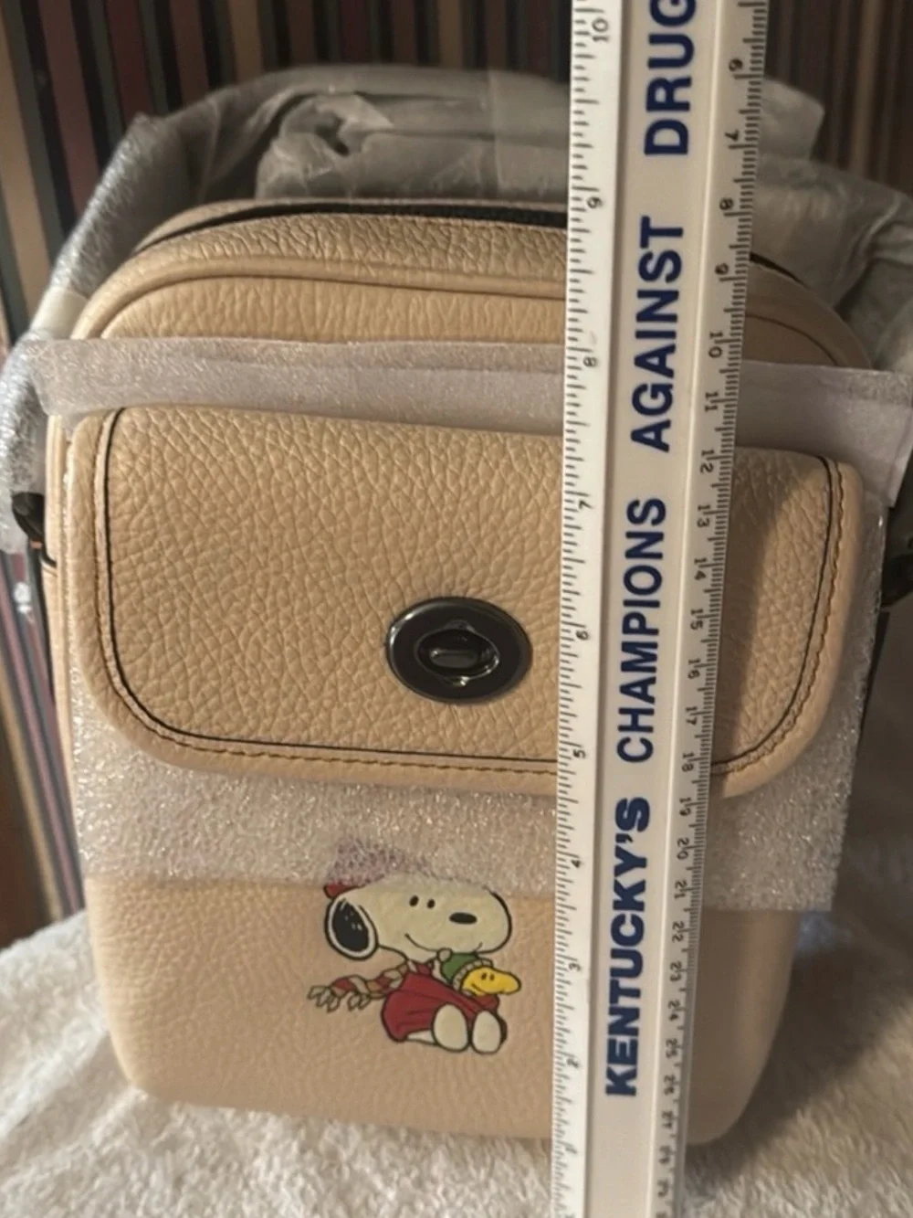 Coach X Peanuts Heritage Crossbody bag featuring Snoopy